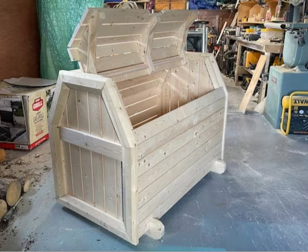 Showing cover open on the chest style storage bin, built from our Chest Style Storage Bin woodworking diy plan